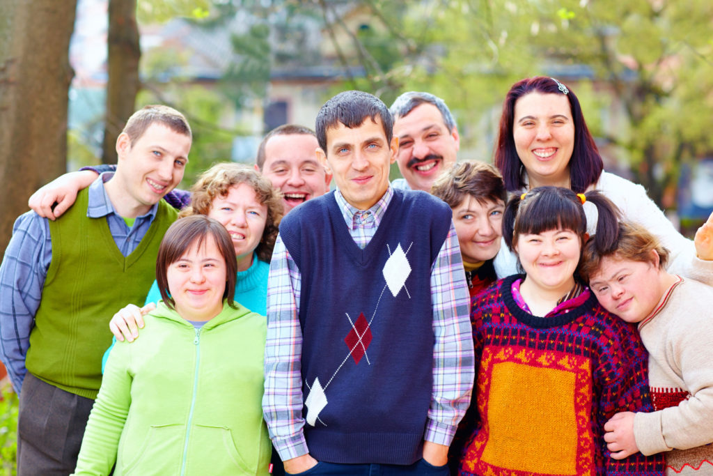 Happy group of people with various disabilities